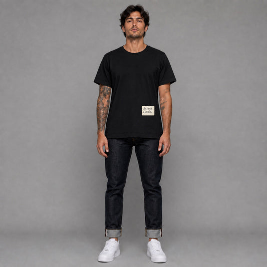 Object Series Black 008 in black — worn by a male model, full length.