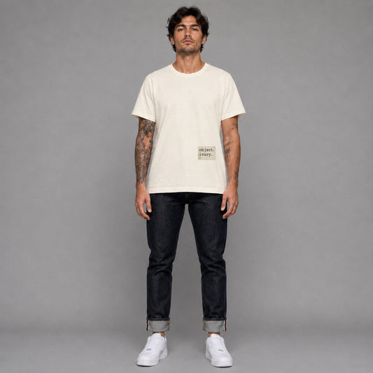 Object Series Ivory 010 in ivory — worn by a male model, full length.