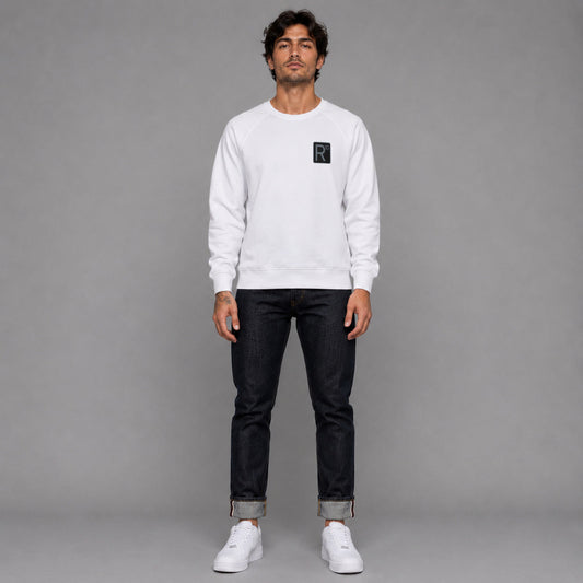 R10 Classic in white — worn by a male model, full length.