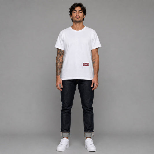 Signature No7 in white — worn by a male model, full length.