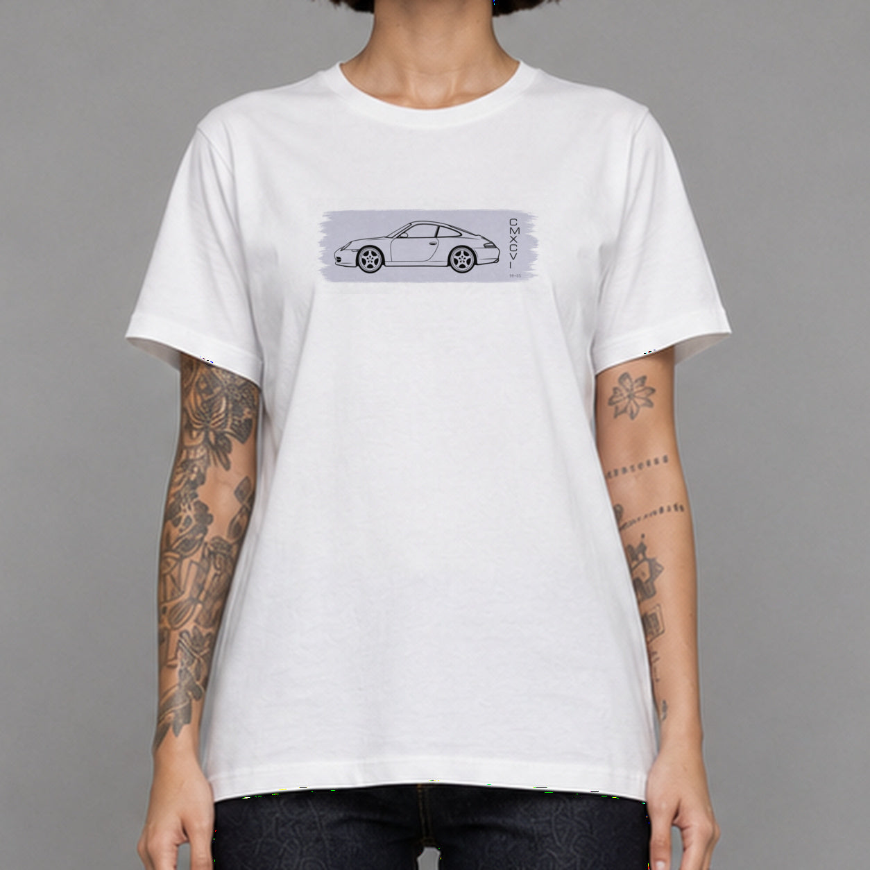 996 in white — worn by a female model, front detail.