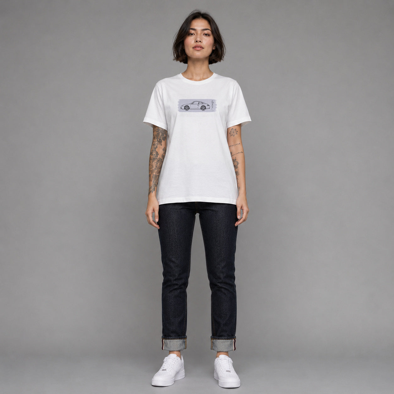 996 in white — worn by a female model, full length.