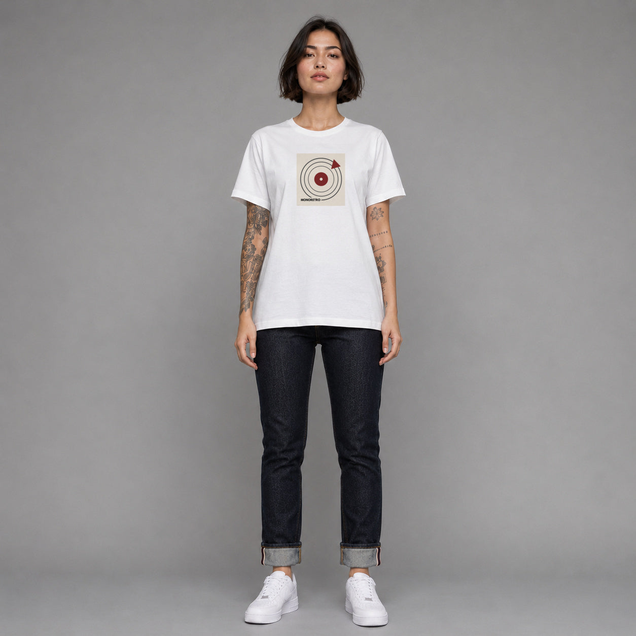 Bauhaus Turntable in white — worn by a female model, full length.