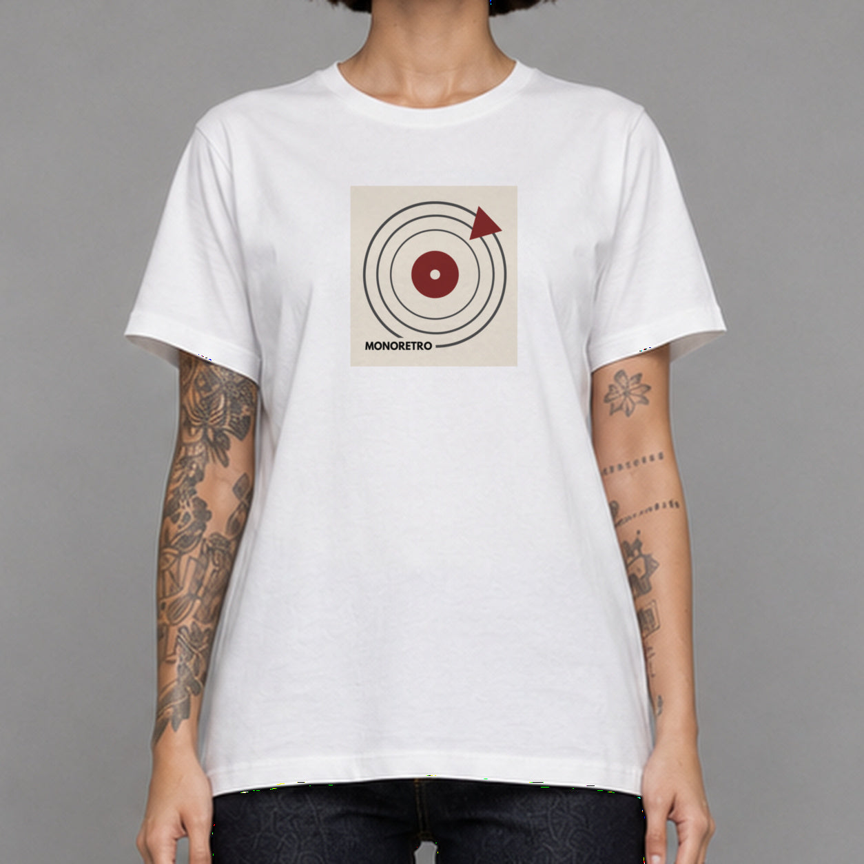 Bauhaus Turntable in white — worn by a female model, front detail.