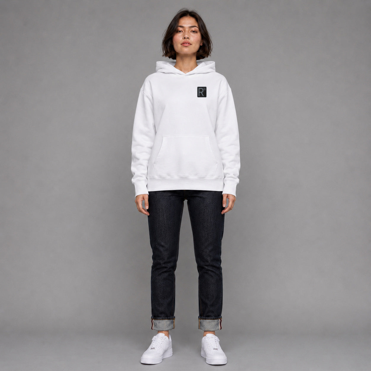 R10 Restaurant & Bar in white — worn by a female model, full length.