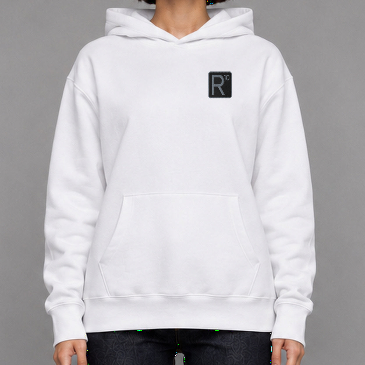 R10 Restaurant & Bar in white — worn by a female model, front detail.