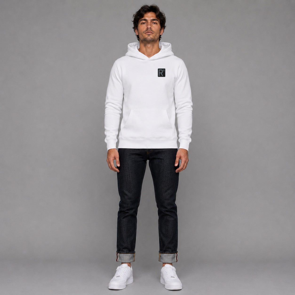 R10 Restaurant & Bar in white — worn by a male model, full length.