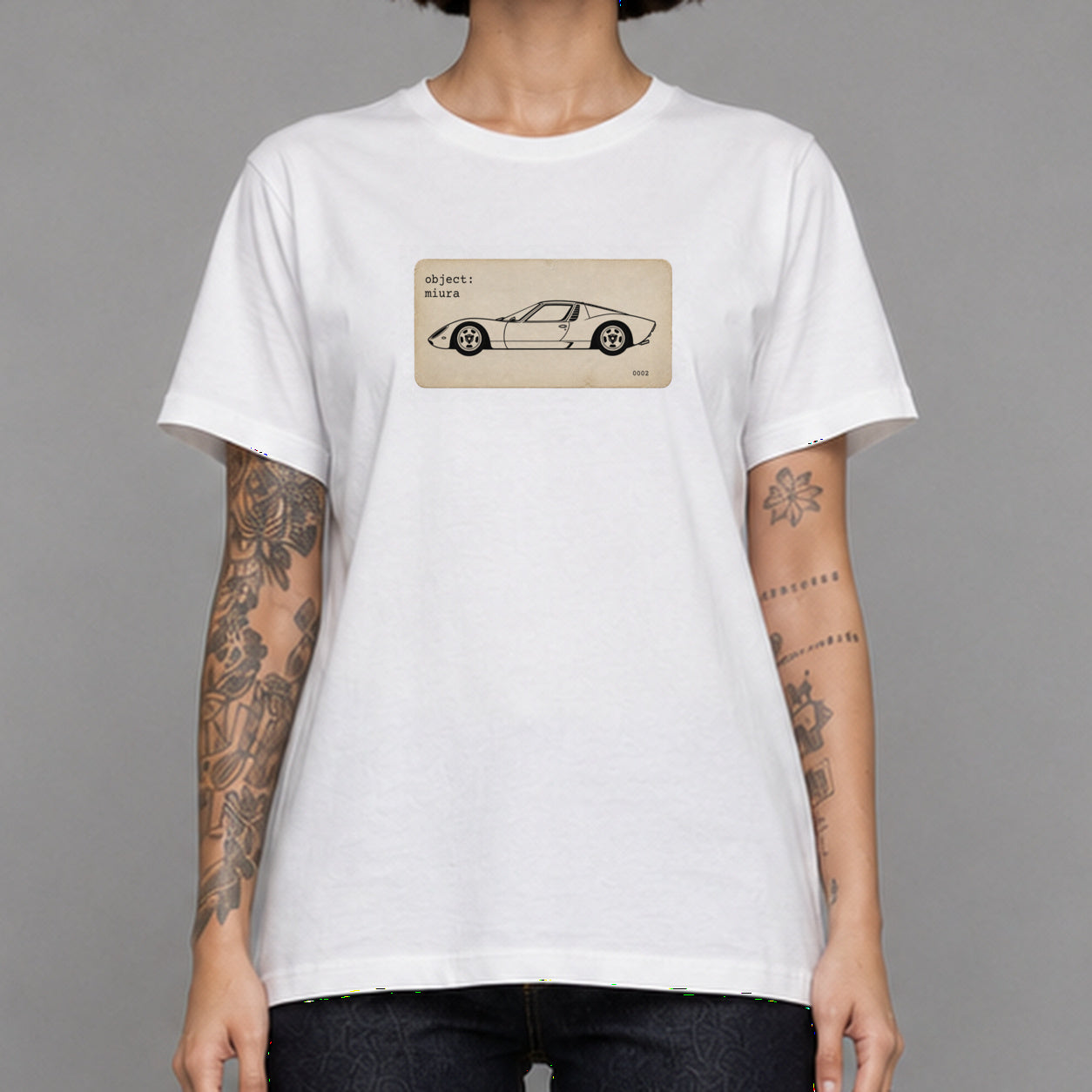 Miura in white — worn by a female model, front detail.