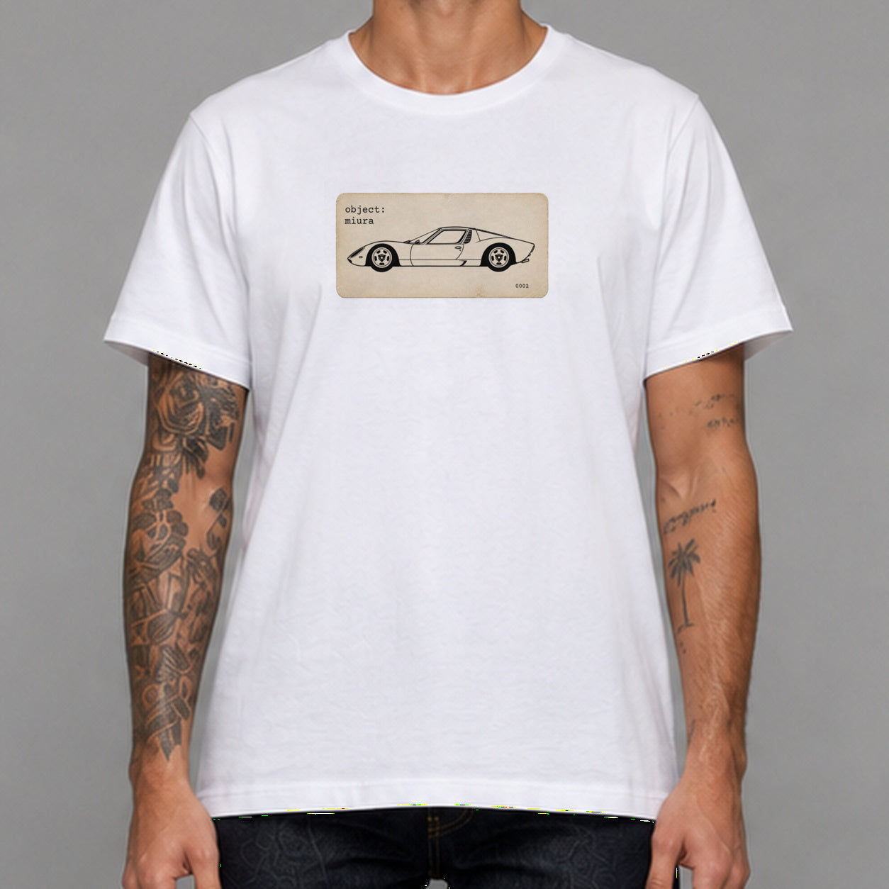 Miura in white — worn by a male model, front detail.