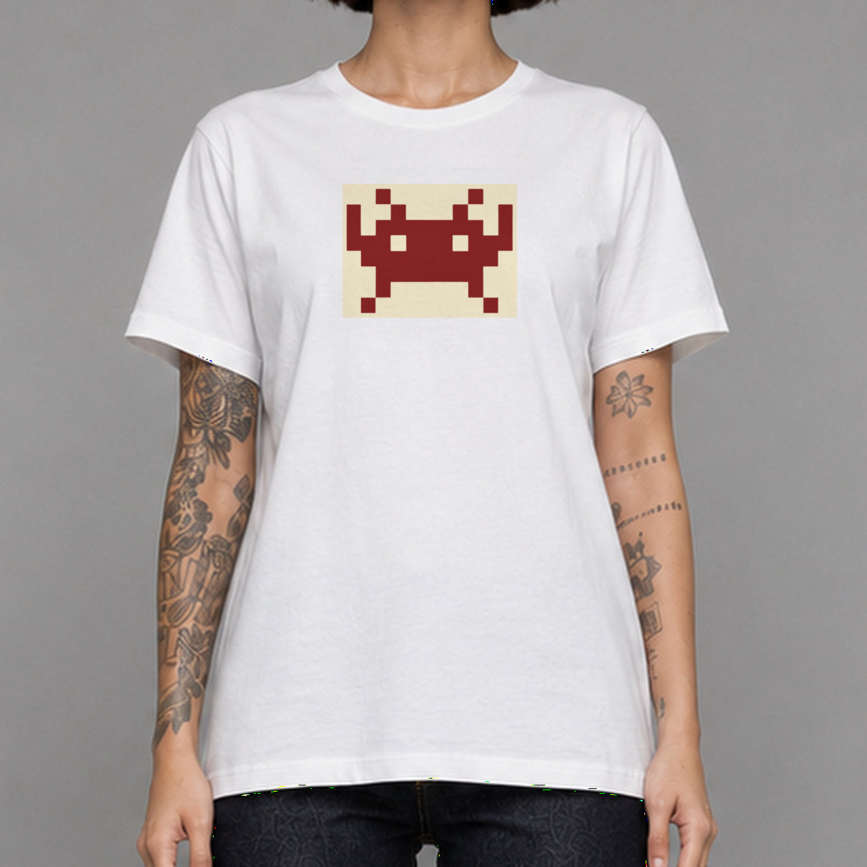 Party Invader in white — worn by a female model, front detail.
