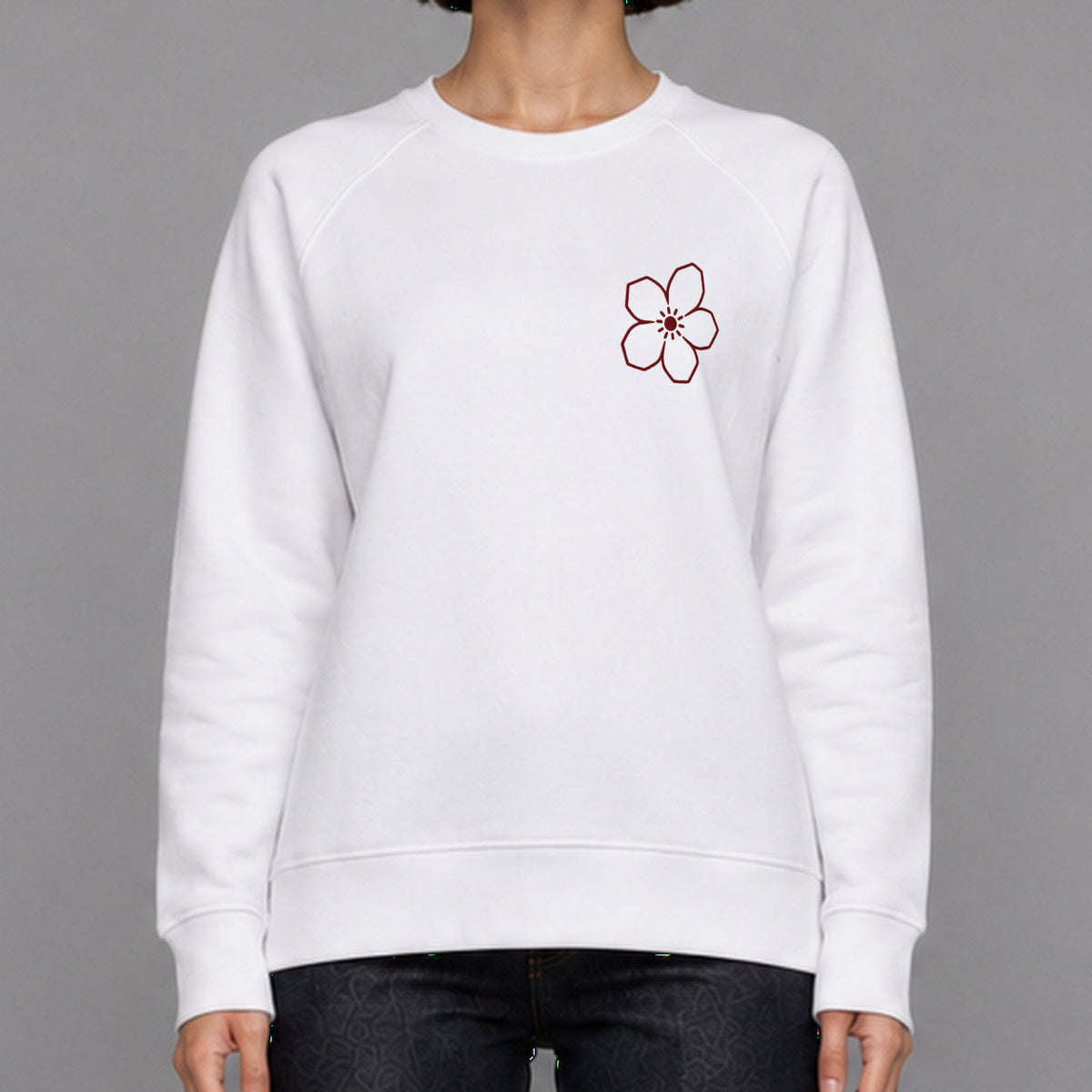 MONORETRO Signature No. 9 Heritage Raglan Sweatshirt in white — worn by female model, front detail