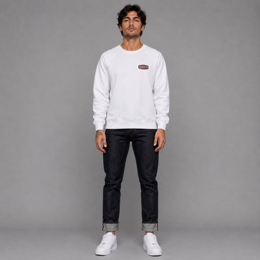 Signature No1 in white — worn by a male model, full length.