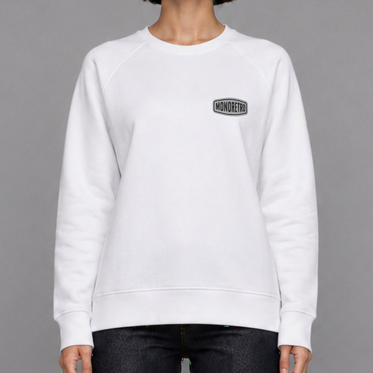 MONORETRO Signature No. 3 Heritage Raglan Sweatshirt in white — worn by female model, front detail