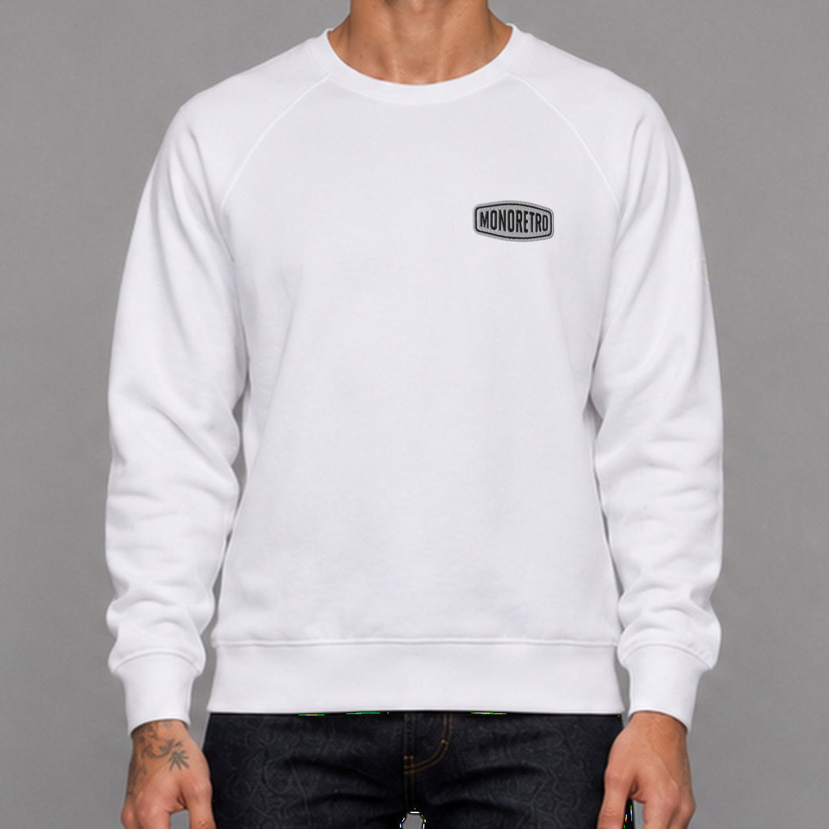 MONORETRO Signature No. 3 Heritage Raglan Sweatshirt in white — worn by male model, front detail