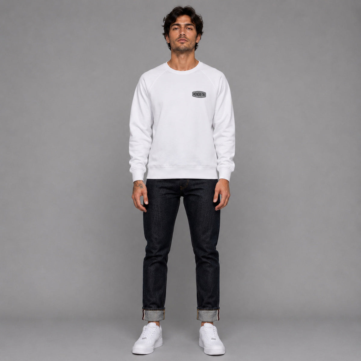 MONORETRO Signature No. 3 Heritage Raglan Sweatshirt in white — worn by male model, full length