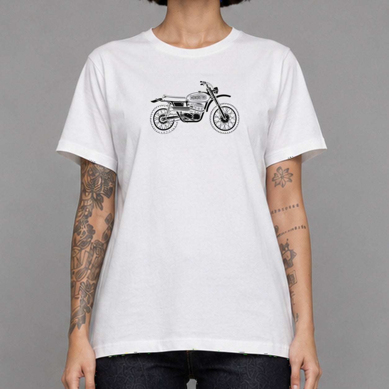 Scrambler in white — worn by a female model, front detail.